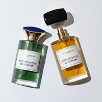 Flacon de parfum élégant et luxueux en verre plat incurvé de 50 ml avec bouchon poli bicolore