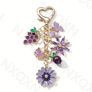 Nouveau porte-clés en métal avec motif de fleur de raisin violet, grenade, papillon, huile de goutte, doux et délicat, pendentif pour sac de voiture - Product Image 5