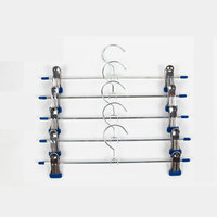 Petits cintres en métal avec revêtement en caoutchouc Cintres à un niveau pour jupe et pantalon pour armoire avec clips