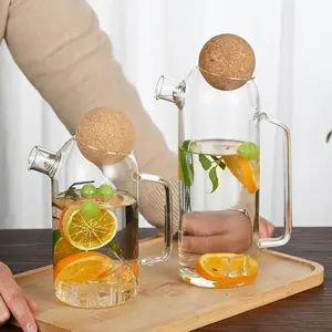 <span class=keywords><strong>Carafe</strong></span> à eau en verre borosilicaté Offres Spéciales 1200mL pichet à eau en verre résistant à la chaleur avec couvercle en liège - Product Image 1
