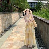 Robe longue à bretelles spaghetti, taille naturelle, à volants, motif floral, style streetwear mignon et élégant pour femme, idéale pour les vacances d'été à la plage