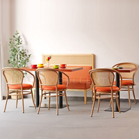 Chaise de salle à manger vintage haut de gamme en rotin, fauteuil de bistrot rembourré en cuir, mobilier de restaurant pour la restauration commerciale