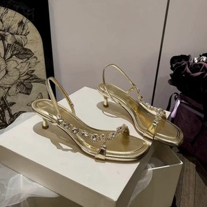 Sandalias de tacón de aguja con una sola tira para mujer, modelo nuevo de primavera 2026, con punta abierta, pedrería, sexys, elegantes, doradas, para bodas y fiestas. - Product Image 1