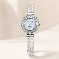 Montre pour femme, bracelet de luxe en perles, montre-bracelet vintage avec lunette en strass ronde, bracelet en alliage, montres élégantes pour femmes