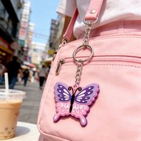 Porte-clés papillon floral en caoutchouc souple durable avec mousqueton, étanche, léger, imprimé UV, tendance