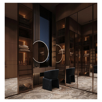 Armoire de chambre moderne minimaliste en placage de bois avec cadre en MDF bronze, miroir en verre trempé et éclairage LED intégré