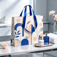 Sacs en papier personnalisés haut de gamme pour produits de beauté avec poignées en ruban, fabrication artisanale de qualité supérieure et sacs de shopping laminés brillants
