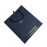 Sac cadeau personnalisé en papier kraft noir mat 250g, en matériau recyclé, avec dorure à chaud pour l'emballage de bougies