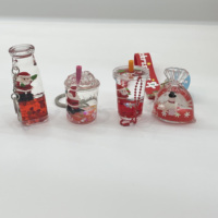 Porte-clés liquides de Noël multi-styles : tasses de thé au lait, flotteurs Père Noël et bonhomme de neige, pendentifs mignons à sable mouvant