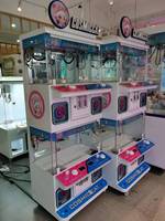 Machine à griffes premium pour 4 joueurs, distributeur de bonbons en capsule à pièces, machine à griffes pour cadeaux, machine de divertissement
