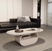 Table basse ovale en dalle de roche style crème moderne, mobilier de salon haut de gamme minimaliste et luxueux