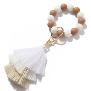 Portachiavi In Legno Personalizzabili colorato disco di perline di Legno braccialetto In Silicone braccialetto Portachiavi rotondo con nappa - Product Image 4