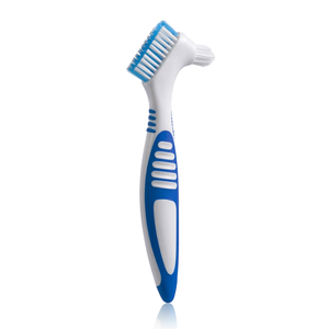Brosse à dents dentaire pour le nettoyage et l'entretien des prothèses dentaires avec poils en silicone, design coloré - Product Image 1