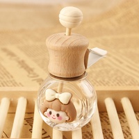 Nouveau design mignon 10ml verre diffuseur de voiture bouteille désodorisant rond dessin animé sortie d'air parfum bouteille en verre décoration de voiture