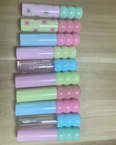 Neue niedliche leere kunststoff-lipgloss-tuben süßigkeiten geformt flüssiger lippenstift behälter verpackung