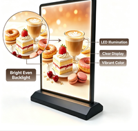 Boîtes lumineuses publicitaires LED pour comptoirs commerciaux avec cadre noir et base robuste pour l'affichage des menus de restaurants et cafés