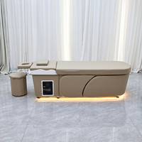 Table de massage de salon moderne de luxe en PU avec appui-tête intégré et éponge haute densité pour usage en salle de sport et atelier