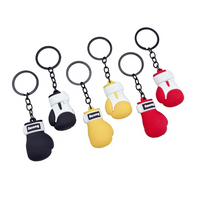 Nuevo Set de Llavero y Abrebotellas 2026: Mini Guantes de Boxeo de PVC Ecológicos con Diseño de Puño de Lucha Sanda