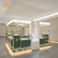Vitrine de luxe carrée en cuir matelassé pour bijouterie, avec cadre doré et éclairage d'ambiance LED pour stand de bijouterie en centre commercial