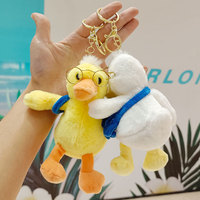 Jouets en peluche mignons au design Kawaii, porte-clés en peluche canard, peluche douce, lunettes, sac à dos, porte-clés canard de dessin animé, porte-clés en peluche