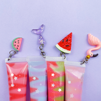 Volume personnalisé en plastique Squeeze Lipgloss Tubes Private Label DIY Cute Keychain Lip Balm Packaging Lipstick Charm Accessories