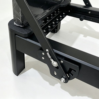 Reformer de studio commercial avec cadre en aluminium noir et tour en acier inoxydable, accessoires complets inclus