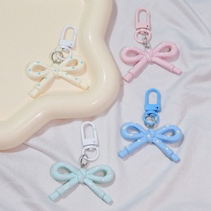Nouveau porte-clés pendentif nœud ajouré couleur bonbon printemps-été, décoration mignonne pour sac à dos en forme de cœur de fille, cadeau idéal pour meilleure amie - Product Image 2