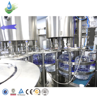 Machine automatique électrique de rinçage, remplissage et bouchage pour bouteilles PET de boissons (air et eau) 5L 10L, contrôle PLC, haute précision 1ml