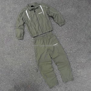 Custom Men Windbreaker Nylon Tracksuit Set Custom Sweat Suits With Piping Stripes Reflective Baggy Windbreaker Tracksuit - Product Image 1