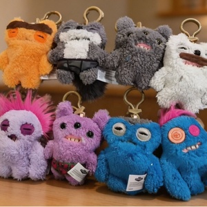 Accessoires pour figurines et jouets en peluche : Tête de monstre à dents larges et visage amusant et moche pour jeunes collectionneurs - Product Image 6