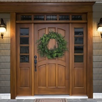 Porte d'entrée double en bois massif de style rustique américain avec poignée noire pour entrée principale de villa