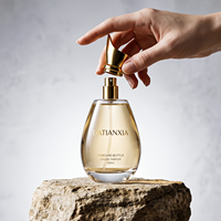 Flacon de parfum en verre cristal rond personnalisé en usine, 30 ml, 50 ml, 100 ml, vaporisateur à pompe, brume fine avec couvercle doré