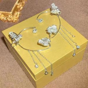 Pendientes Minimalistas de Acero Inoxidable para Mujer, con Incrustaciones de Diamantes Brillantes, Diseño de Mariposa y Flor, con Borla, a la Moda - Product Image 5