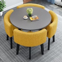 Table ronde en bois de qualité supérieure pour la maison avec quatre sièges confortables, confort et style de repas inégalés
