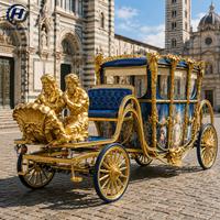 Calèche de mariage électrique royale avec décorations de figurines dorées jumelées pour hôtels, zones scéniques et services de transport événementiel