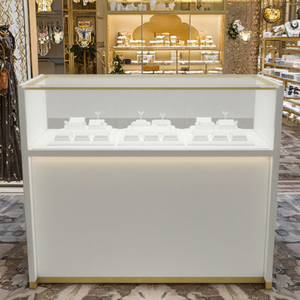 Vente directe d'usine, <span class=keywords><strong>vitrine</strong></span> de présentation de <span class=keywords><strong>bijoux</strong></span> moderne de luxe haut de gamme en verre trempé, acier inoxydable, MDF, éclairage LED - Product Image 1