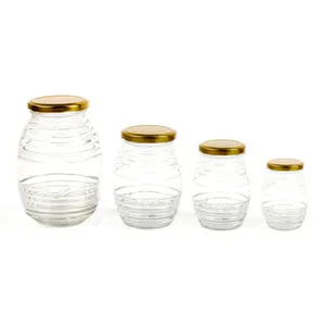 China Supplier Wholesale 150g 250g 500g 1000g Honeycomb Shape Glass Honey Jars