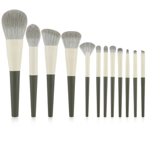 Nouvel ensemble de 12 pinceaux de maquillage portables de voyage en fibres synthétiques de haute qualité avec manche en plastique souple pour poudre libre, blush et contour - Product Image 1