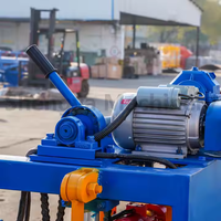 Machine à fabriquer des briques creuses en béton SHENGYA QM2-45 avec moule et moteur, facile à utiliser, certifiée CE, idéale pour les petites entreprises