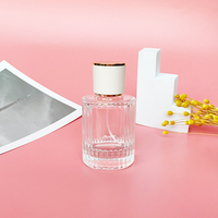 Nuevo Estilo Botella de Perfume de Vidrio de Lujo de 30ml con Forma de Cilindro y Frasco de Vidrio Transparente con Atomizador de 50ml