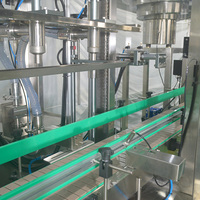 Ligne de traitement d'emballage automatique de haute qualité pour le remplissage, le bouchage et l'étiquetage des barils et bouteilles d'huile alimentaire, haute sécurité
