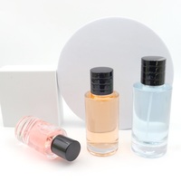 Bouteille de parfum en verre en forme de cylindre 100ML 30ML 50ML avec couvercle magnétique et boîte pour stockage et affichage de parfum