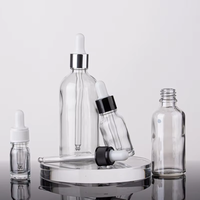 Flacon compte-gouttes en verre transparent de 30 ml, directement de l'usine, avec emballage en boîte sérigraphiée pour huiles essentielles, parfums, sérums cosmétiques