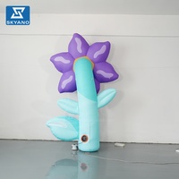 Modèle de fleur gonflable personnalisé violet avec tige pour la décoration d'événements publicitaires en extérieur, sur scène ou dans les lieux touristiques