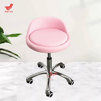 Moderner Rosa Salon-Hocker Verstellbarer Kosmetikstuhl mit Rollen für Wimpern- und Make-up-Studios