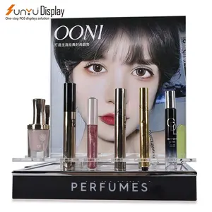 Fábrica de venta al por mayor de negocios personalizados cosméticos maquillaje perfume soporte de exhibición de acrílico para exposición