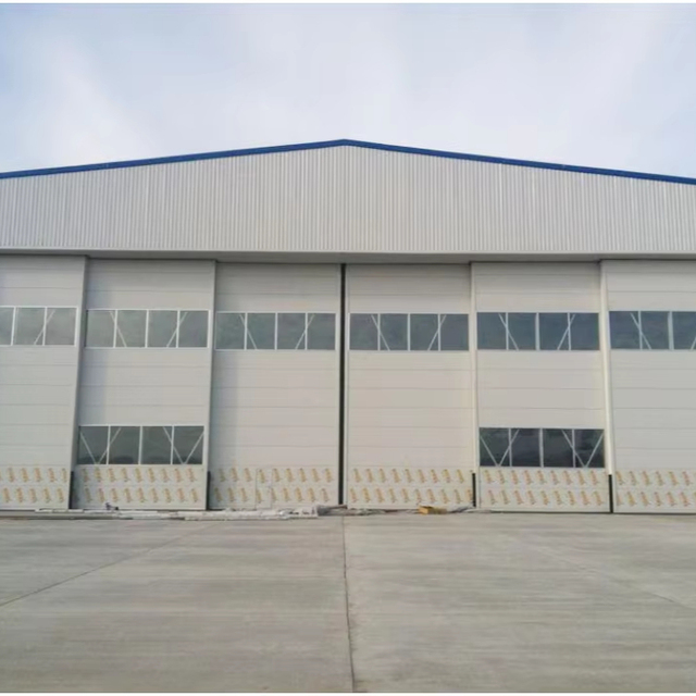 Airplane Composite Sliding Flexible Lifting Industrial Finished Warehouse Mega Hangar Door Thermal Insulation Electric Side