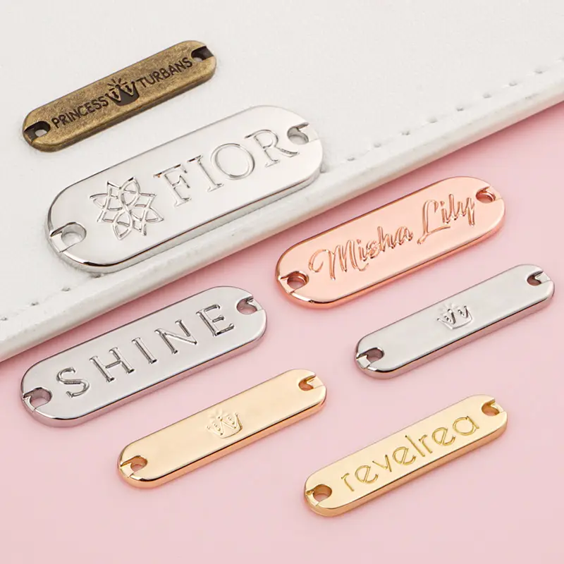 Accesorios de Metal para ropa de baño, etiqueta de logotipo de Bikini para coser, etiquetas de Metal, marca personalizada