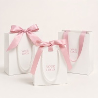 Sacs cadeaux roses biodégradables écologiques personnalisés avec poignée en ruban et laminage pour l'emballage de parfums, de rouges à lèvres, de cosmétiques et de bijoux