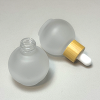 Nouvelle bouteille en verre pour huile essentielle avec bouchon en bambou, 20 ml, 30 ml, 50 ml, forme ronde, verre givré, flacon compte-gouttes